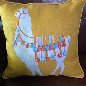 Golden rod colored Lama pillow. Very good condition. Smoke free home